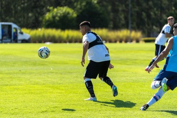 football midfielder passing ball